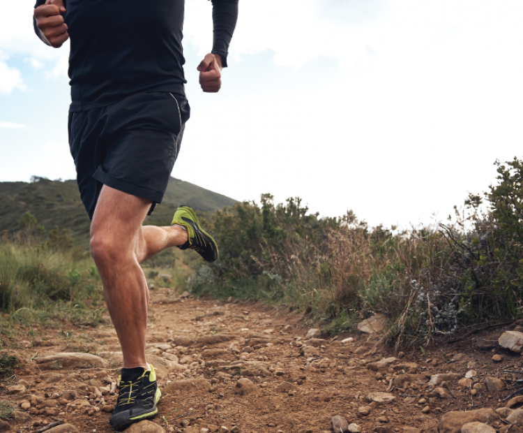 Man running on trail